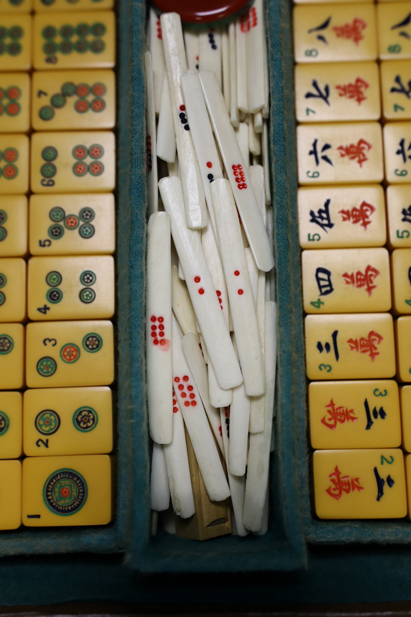 A 1920's leather travelling mahjong set